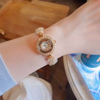 SALE BỎ MẪU HÀNG XI ĐỒNG HỒ NỮ THỜI TRANG TRANEL DÂY MẶT HOA VIỀN HỘT 4989