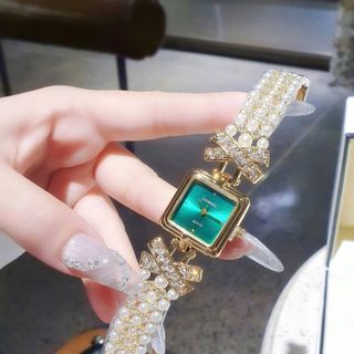 SALE BỎ MẪU ĐỒNG HỒ NỮ THỜI TRANG TRANEL DÂY VÀNG NGỌC TRAI 5445