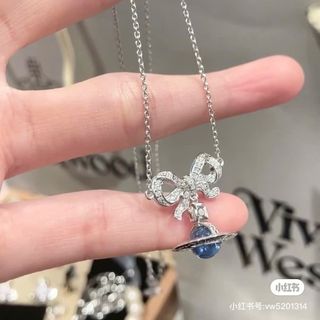 HOA TAI VÀ DÂY CHUYỀN CAO CẤP VIVIEN MẶT NƠ ĐÁ FULLBOX