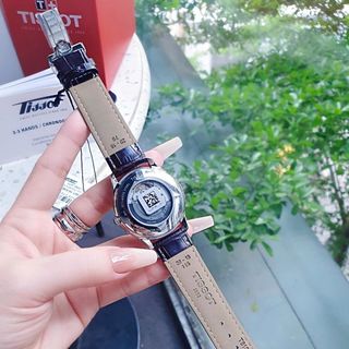 ĐỒNG HỒ NAM CƠ THỤY SĨ TIXOT DÂY DA KÍNH SAPHIRE LỘ MÁY MẶT TRẮNG VIỀN BẠC