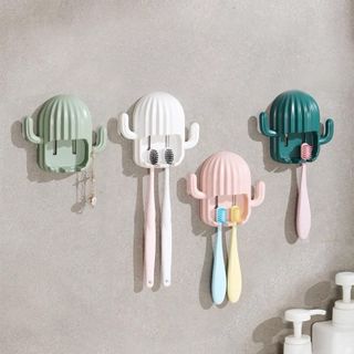 GIÁ TREO BÀN CHẢI HÌNH XƯƠNG RỒNG giá sỉ