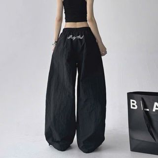 Quần Ống Rộng Trơn Thêu Chữ Phía Sau Chất Dù Nhăn Mịn Mát Freesize Dưới 63kg