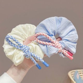 CỘT TÓC NƠ THẮT NÚT