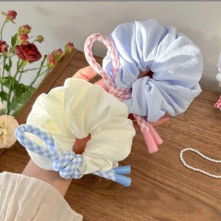 CỘT TÓC NƠ THẮT NÚT