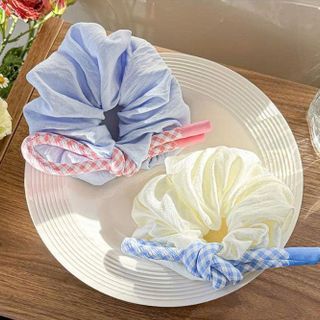 CỘT TÓC NƠ THẮT NÚT