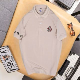 Áo thun co co theu logo thổ dân