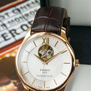 ĐỒNG HỒ NAM THỤY SĨ TIXOT DÂY DA KÍNH SAPHIRE LỘ MÁY MẶT TRẮNG VIỀN HỒNG AUTOMATIC