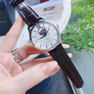 ĐỒNG HỒ NAM THỤY SĨ TIXOT DÂY DA KÍNH SAPHIRE LỘ MÁY MẶT TRẮNG VIỀN BẠC AUTOMATIC