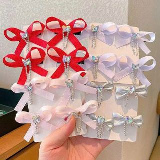 VĨ 4 KẸP TÓC NƠ DÂY ĐÁ