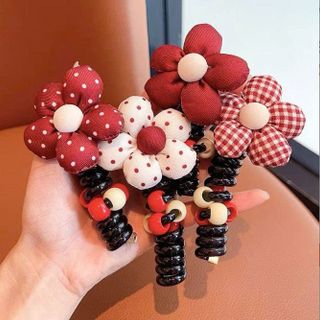 CỘT TÓC LÒ XO RUỘT GÀ HOA NƠ PHỒNG