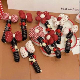 CỘT TÓC LÒ XO RUỘT GÀ HOA NƠ PHỒNG