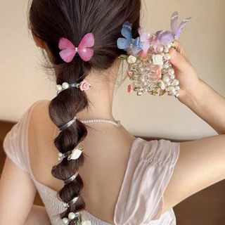 CỘT TÓC LÒ XO RUỘT GÀ BƯỚM HOA NGỌC