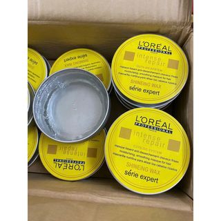 Sáp vuốt tóc L'OREAL trong tạo kiểu tóc tự nhiên.