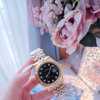 ĐỒNG HỒ NAM NỮ CAO CẤP RÔLET DÂY THÉP VÀNG NIỀNG KHÍA