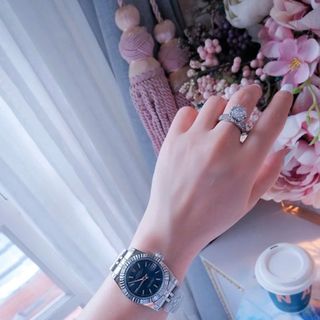 ĐỒNG HỒ NAM NỮ CAO CẤP RÔLET DÂY THÉP BẠC NIỀNG KHÍA