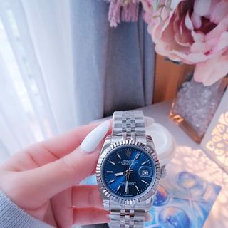 ĐỒNG HỒ NAM NỮ CAO CẤP RÔLET DÂY THÉP BẠC NIỀNG KHÍA