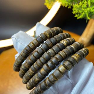 Vòng tay trầm hương Kì Hải Nam chìm nước bánh xe hạt nút 6mm 5gram thơm thanh ngọt 035