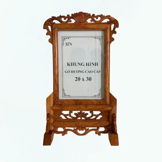 Khung ảnh thờ gỗ hương đá thờ gia tiên kích thước 20x25, 21x31, 25x35. Chất liệu gỗ hương đẹp truyền thống, bảo hành 12 tháng