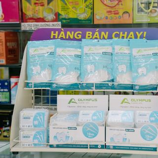 Tăm chỉ nha khoa OLYMPUS lốc 12 hộp (600pcs) - Tăm chỉ nha khoa thương hiệu Việt Nam chất lượng cao.