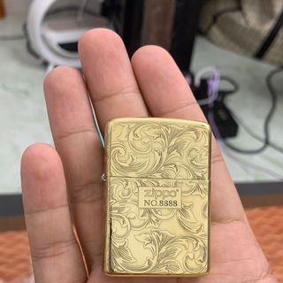 Zippo đồng khối 9 lama hoa văn