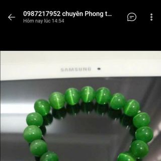 Chuỗi đeo tay 10ly đá mắt mèo xanh lá mix hạt châu