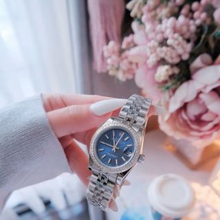 ĐỒNG HỒ NAM NỮ CAO CẤP RÔLET DÂY THÉP BẠC MẶT XANH VIỀN HỘT