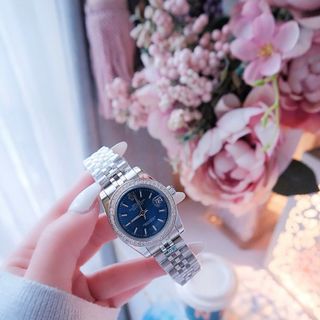 ĐỒNG HỒ NAM NỮ CAO CẤP RÔLET DÂY THÉP BẠC MẶT XANH VIỀN HỘT