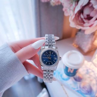 ĐỒNG HỒ NAM NỮ CAO CẤP RÔLET DÂY THÉP BẠC MẶT XANH VIỀN HỘT