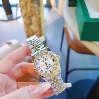 ĐỒNG HỒ NAM NỮ CAO CẤP RÔLET DÂY THÉP DEMI VÀNG VIỀN HỘT