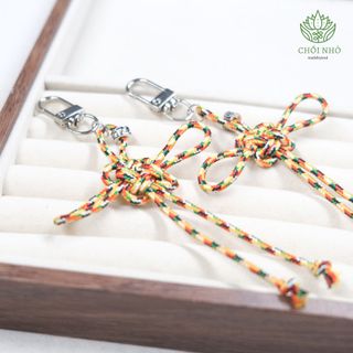 Móc khóa, móc túi xách nút ngũ sắc cát tường vàng