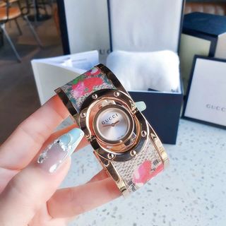 ĐỒNG HỒ NỮ CAO CẤP GUCHI VÒNG BẢNG MẶT XOAY NIỀNG VÀNG