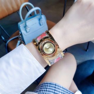 ĐỒNG HỒ NỮ CAO CẤP GUCHI VÒNG BẢNG MẶT XOAY NIỀNG VÀNG