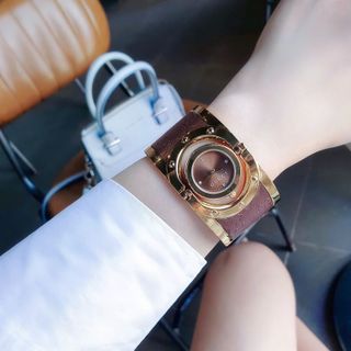 ĐỒNG HỒ NỮ CAO CẤP GUCHI VÒNG BẢNG MẶT XOAY NIỀNG VÀNG