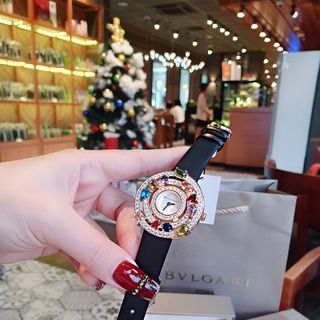 ĐỒNG HỒ NỮ CAO CẤP PVLGARI DÂY DA VIỀN ĐÁ PHONG THỦY NIỀNG VÀNG GOLD