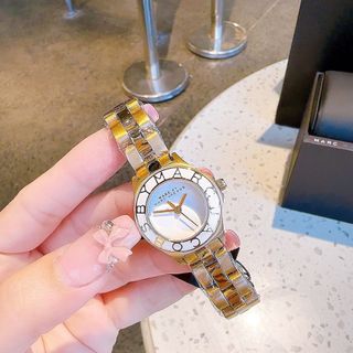 ĐỒNG HỒ NỮ CAO CẤP MACR DÂY THÉP MẶT VIỀN CHỮ MINI