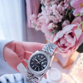 ĐỒNG HỒ NAM NỮ CAO CẤP RÔLET DÂY THÉP BẠC VIỀN HỘT KÍNH SAPHIRE