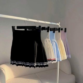 Váy xếp ly viền chất dù co dãn phối lưng thun