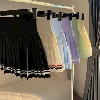 Váy xếp ly viền chất dù co dãn phối lưng thun