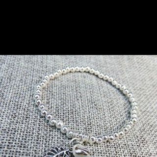 Chuỗi đeo tay phong thủy đẹp nha kim loại mẫu mới