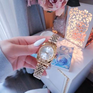 ĐỒNG HỒ NAM NỮ CAO CẤP RÔLET DÂY THÉP MẶT TRƠN NIỀNG KHÍA