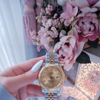 ĐỒNG HỒ NAM NỮ CAO CẤP RÔLET DÂY THÉP MẶT TRƠN NIỀNG KHÍA