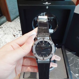 ĐỒNG HỒ COUPLE SIÊU CẤP NHÀ MÁY HB HULOT CAO SU BỌC DA ĐEN CÓ GIẤY KIỂM ĐỊNH