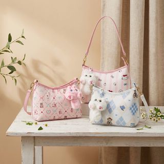 TÚI XÁCH NỮ DA PU HỌA TIẾT ĐÁNG YÊU TẶNG MÓC TREO SAO BÔNG W774 - WINNIE HOUSE