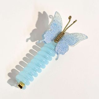 Kẹp tóc bướm xoắn pastel lấp lánh