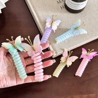 Kẹp tóc bướm xoắn pastel lấp lánh