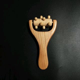 Con lăn massage gỗ tự nhiên cầm tay