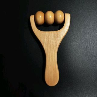 Con lăn massage gỗ tự nhiên cầm tay