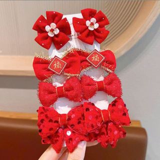 VĨ 8 KẸP TÓC ĐỎ NHỒI BÔNG KIM TUYẾN