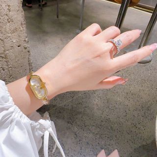 ĐỒNG HỒ NỮ CAO CẤP PENDI VÒNG KIỀNG VÀNG MẶT CHỮ NHẬT PHÔM DÀI