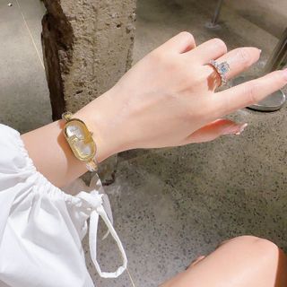 ĐỒNG HỒ NỮ CAO CẤP PENDI VÒNG KIỀNG VÀNG MẶT CHỮ NHẬT PHÔM DÀI